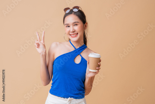 attractive charm asian casual dress woman confident standing hand hold coffee cup laptop active smile leisure lifestyle studio shot business casual woman active motive technology woman hand finger