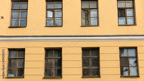 A tall building that features a large number of windows on its exterior