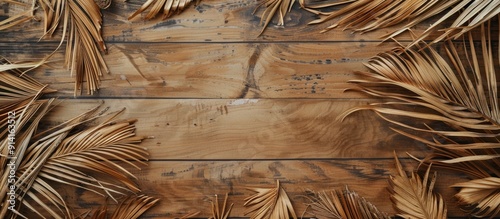 Dried palm leaves used for ancient manuscripts on a wooden background perfect as a writing material back then with a blank copy space image for text shown from top and side views