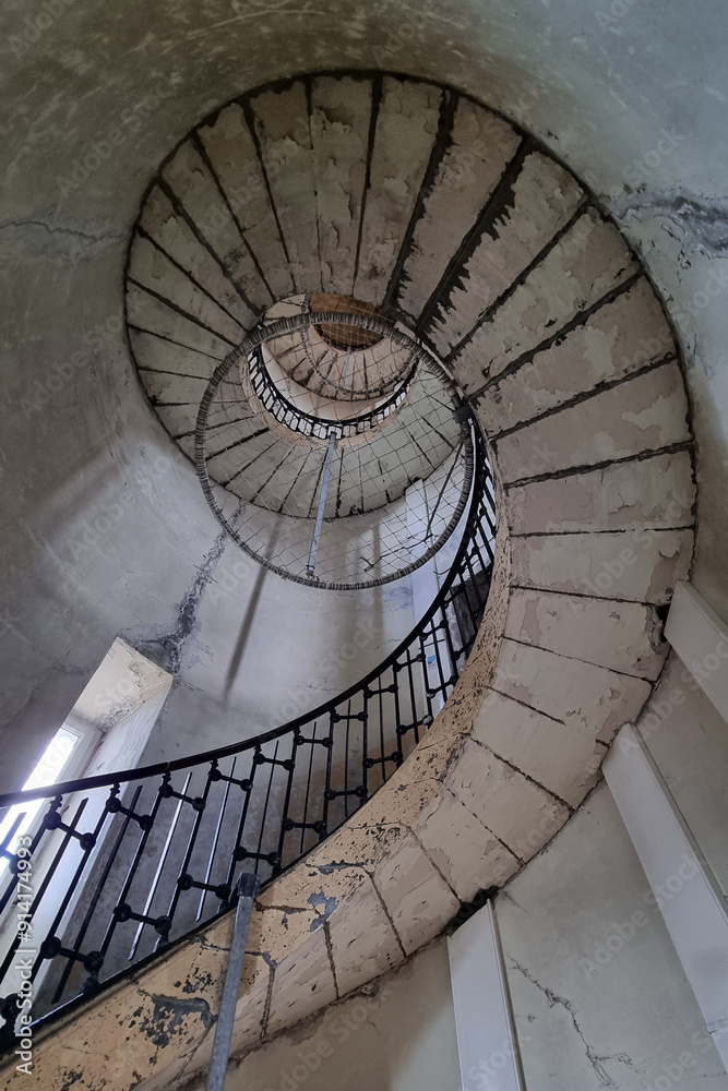 Obraz premium Spiral Staircase in Old Abandoned Building - Architectural Photography Design for Print, Poster, Card