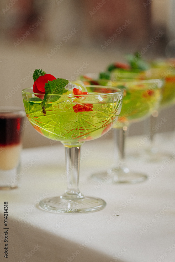 Welcome drink with cocktail glasses and drinks at an event. Alcoholic beverages at a wedding Welcome drink with cocktail glasses and drinks at an event. Alcoholic beverages at a wedding
