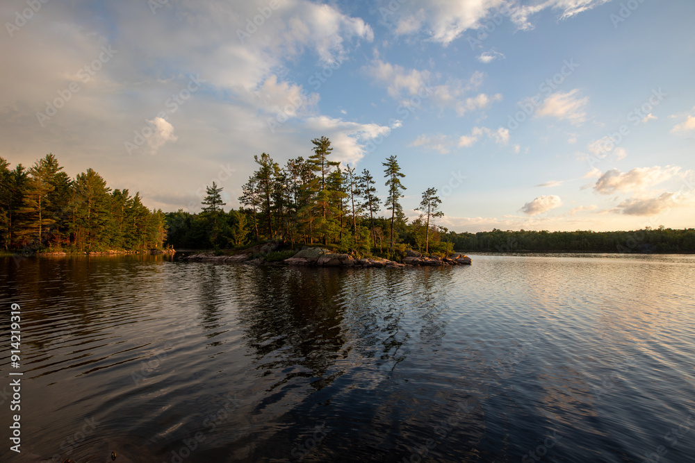 Naklejka premium Sunset over a lake in northern Ontario.