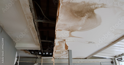 Office building or house problem for house service. Ceiling panels with fungus outside house from water pipes damaged or rainy leaked.