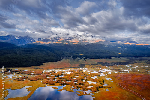 Beautiful aerial view autumn landscape photo of Dzhangyskol lake in Eshtykel plateau background mountains, Altai Republic, Russia. photo