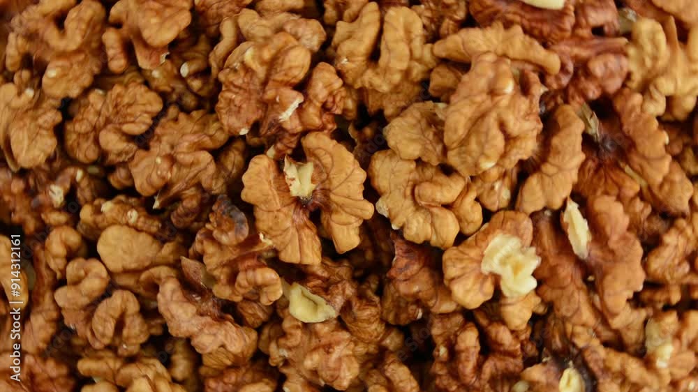 Walnuts rotate. View from above. Close-up Walnuts rotate. View from above. Close-up