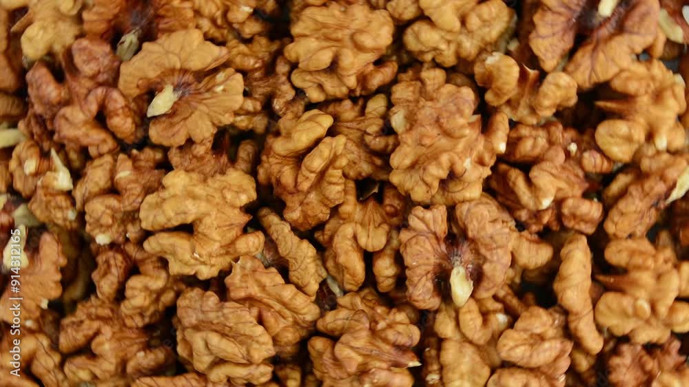 Walnuts rotate. View from above. Walnuts rotate. View from above.