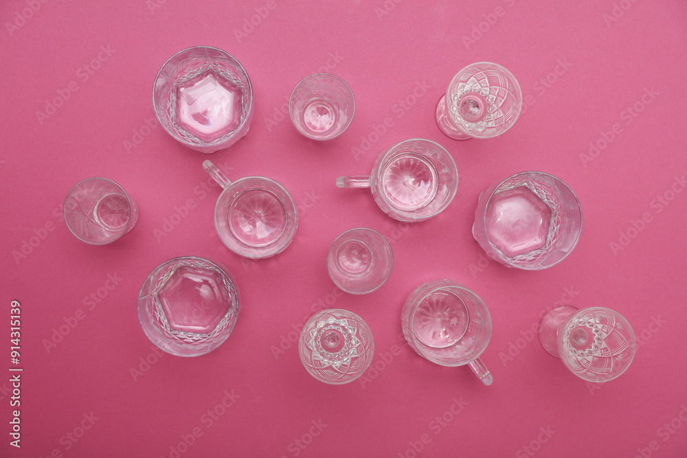 Drink glasses on pink background. Top view. Minimalism, creative layout