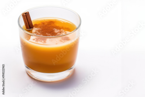 Classical hot buttered rum with cinnamon isolated on white for winter holidays, copy space