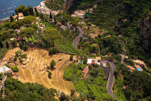 Obraz na płótnie Aerial View of Beautiful Italian Countryside with Vineyards and Hills, curvy road aerial drone shot, Italy, Europe w salonie
