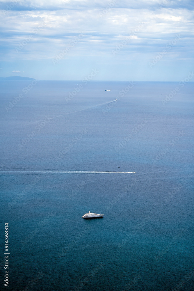 Scenic Ocean View With Multiple Boats On A Calm Day
