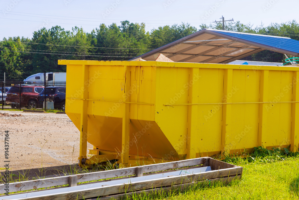 During construction, waste is stored in metal containers in dumpsters During construction, waste is stored in metal containers in dumpsters