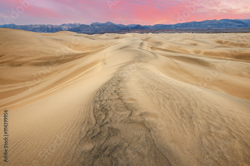 Landscape at sunrise of the Mesquite Flat Sand Dunes and Panamint Mountains, Death Valley National Park, California, USA photo