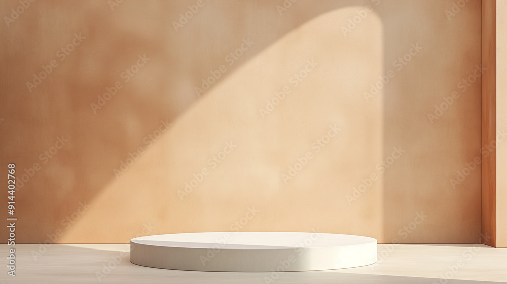 Fototapeta premium A white pedestal with a shadow on the wall