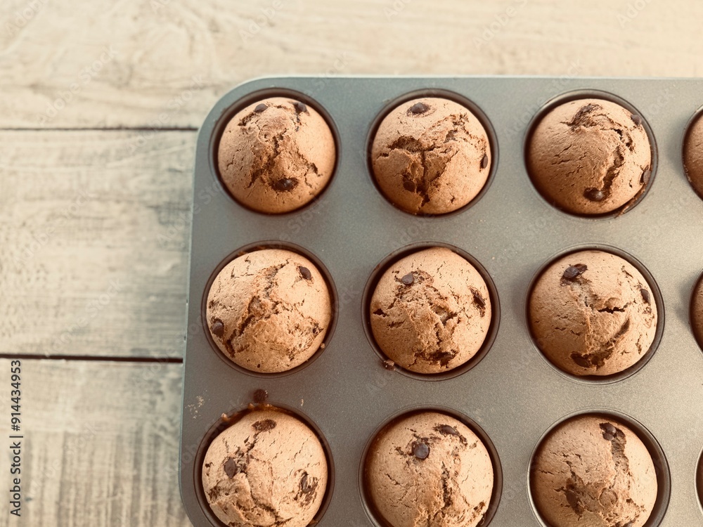 Freshly baked muffins on the table. Freshly baked muffins on the table.