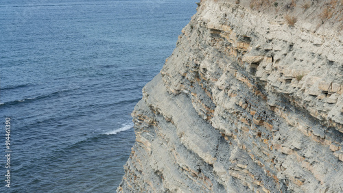 rock in the sea, seashore with sedimentology and stratigraphy