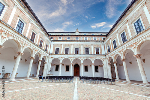 View of renaissance courtyard of the Ducal Palace of Urbino , city and World Heritage Site in Marche region, Italy.