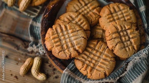 Nostalgic top-down view of a batch of freshly baked peanut butter cookies, Fujifilm X-Pro 3, 35 mm, soft natural light, morning interior. photo