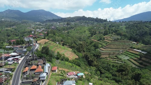 Northern mountainous part of the island of Bali in Indonesia, view from above of the road through the mountains photo