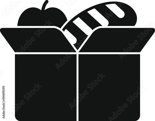 Open cardboard box full of groceries containing an apple and a loaf of bread