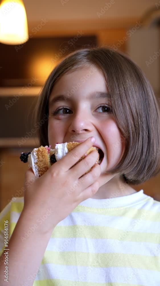 A cheerful school-aged girl enjoys a sweet moment as she takes a bite of a delicious cake slice, capturing the joy and innocence of childhood. A cheerful school-aged girl enjoys a sweet moment as she takes a bite of a delicious cake slice, capturing the joy and innocence of childhood.