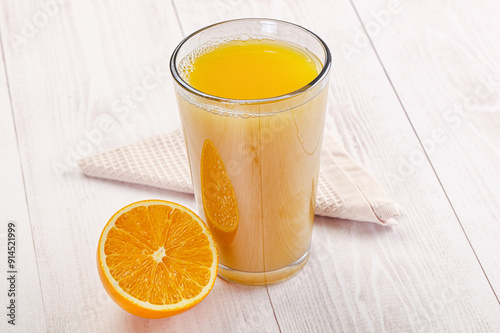 Sweet fresh orange juice in the glass