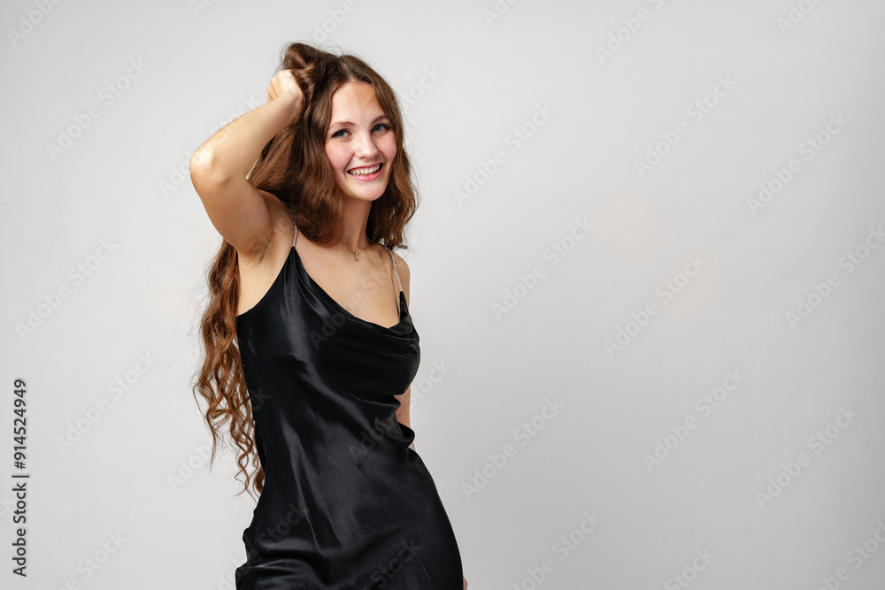 Woman in Black Slip Dress Dancing and Smiling in Studio Woman in Black Slip Dress Dancing and Smiling in Studio