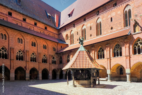 Malbork, Poland - the photo shows a fragment of the Teutonic Knights' castle, dedicated to the Blessed Virgin Mary. The castle was built in several stages from 1280 to the mid-15th century.