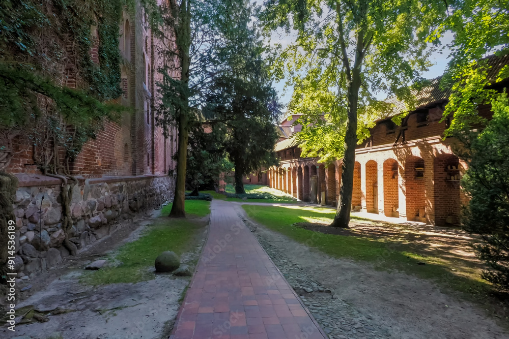 Malbork, Poland - the photo shows a fragment of the Teutonic Knights' castle, dedicated to the Blessed Virgin Mary. The castle was built in several stages from 1280 to the mid-15th century. Malbork, Poland - the photo shows a fragment of the Teutonic Knights' castle, dedicated to the Blessed Virgin Mary. The castle was built in several stages from 1280 to the mid-15th century.