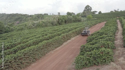 Tractor moving through a farm