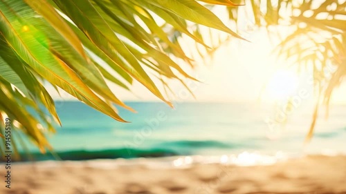 blurred beautiful nature, green palm leaves on tropical beach with bokeh lights