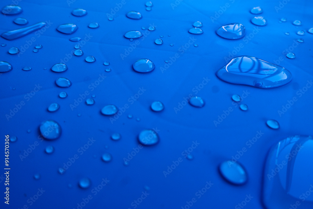 Graphic resource. Backgrounds and textures. Volumetric water drops on a blue background. Graphic resource. Backgrounds and textures. Volumetric water drops on a blue background.