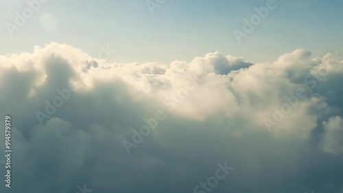 Wallpaper Mural Serene Cloudscape Aerial View of Soft, Fluffy Clouds and Vibrant Blue Sky Above You. Experience a serene aerial view of fluffy clouds against a clear blue sky, embodying tranquility and peace Torontodigital.ca