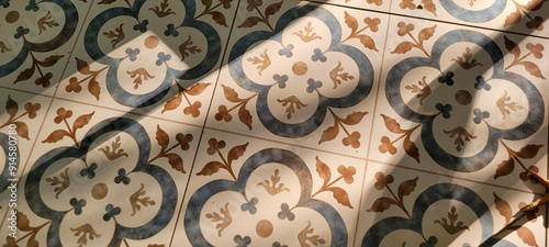 decorative blue and yellow Portuguese flooring, illuminated by the sun