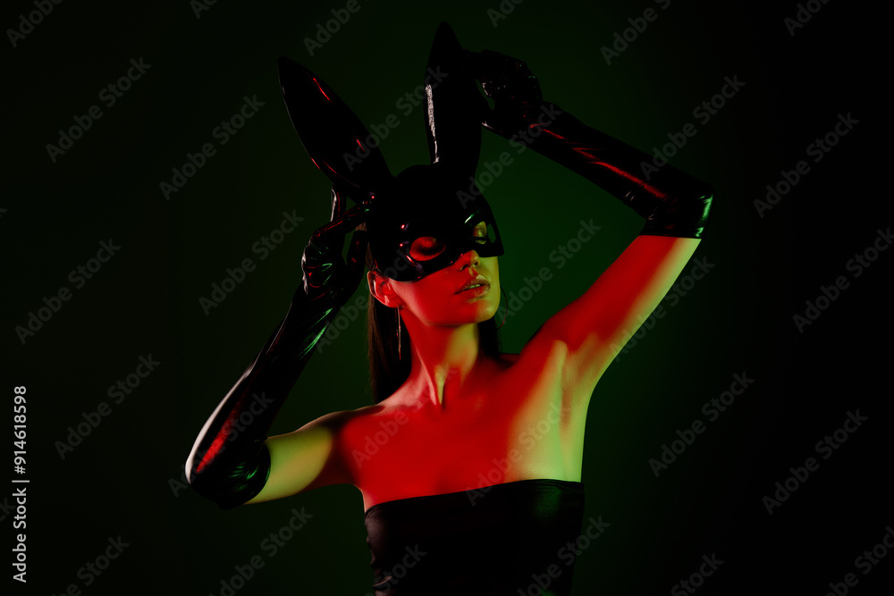 Obraz premium Photo of gorgeous fashionable lady girlfriend sexy posing nightclub dancer in bunny costume black background