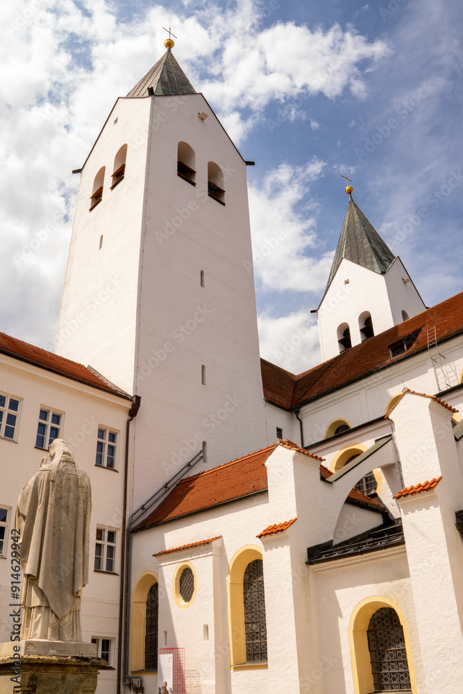 Fototapeta premium Freising, Bavaria, Germany. Tower and walls around St. Maria und St. Korbinian (St. Maria und Korbinian Cathedral) of the former Diocese of Freising