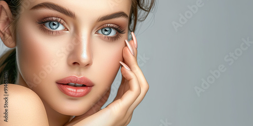 Close-up Portrait of a Young Woman with Blue Eyes and Soft Skin.