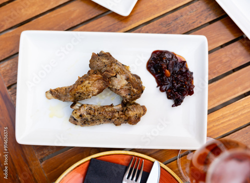 Confit ribs with demi-glace sauce - gourmet lunch photo