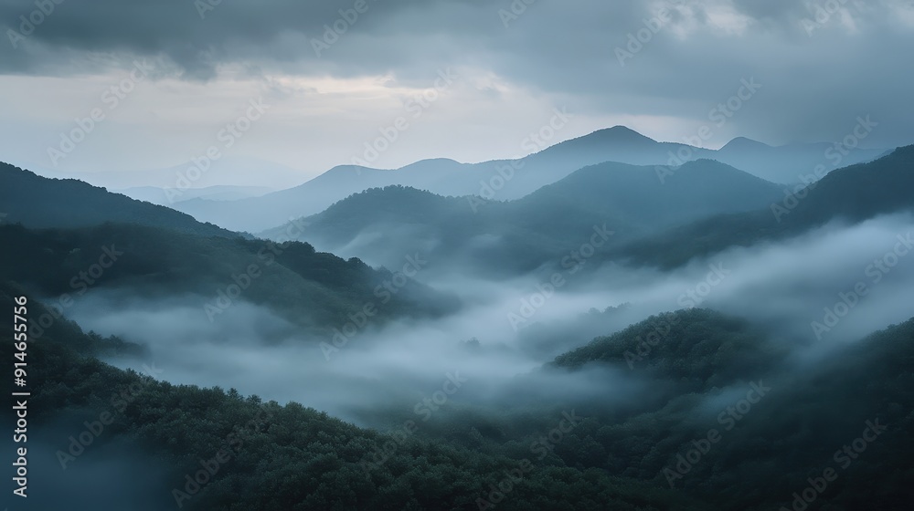 Moody Landscape of Fog-Covered Valley at Dawn with Mountain Silhouettes, Serene and Mysterious Scenery Moody Landscape of Fog-Covered Valley at Dawn with Mountain Silhouettes, Serene and Mysterious Scenery
