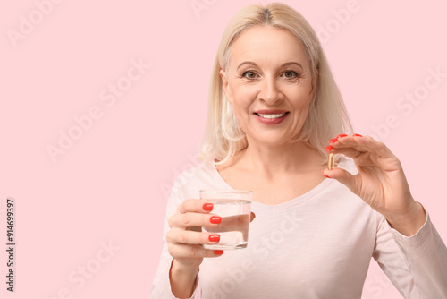 Mature woman with fish oil ...
