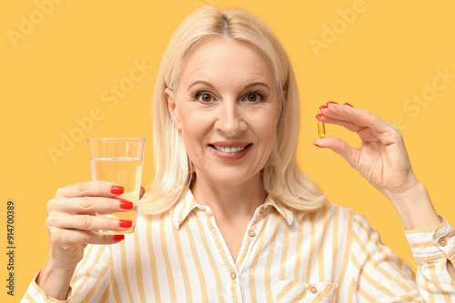 Mature woman with fish oil ...