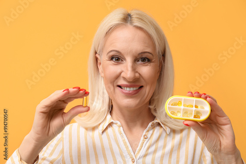 Mature woman with container...