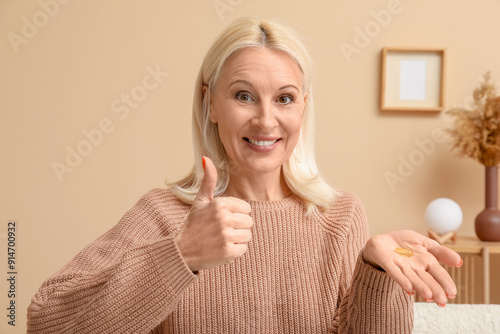 Mature woman with fish oil ...