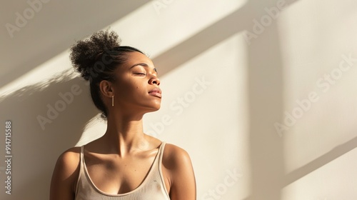 Woman with natural beauty in sunlight.