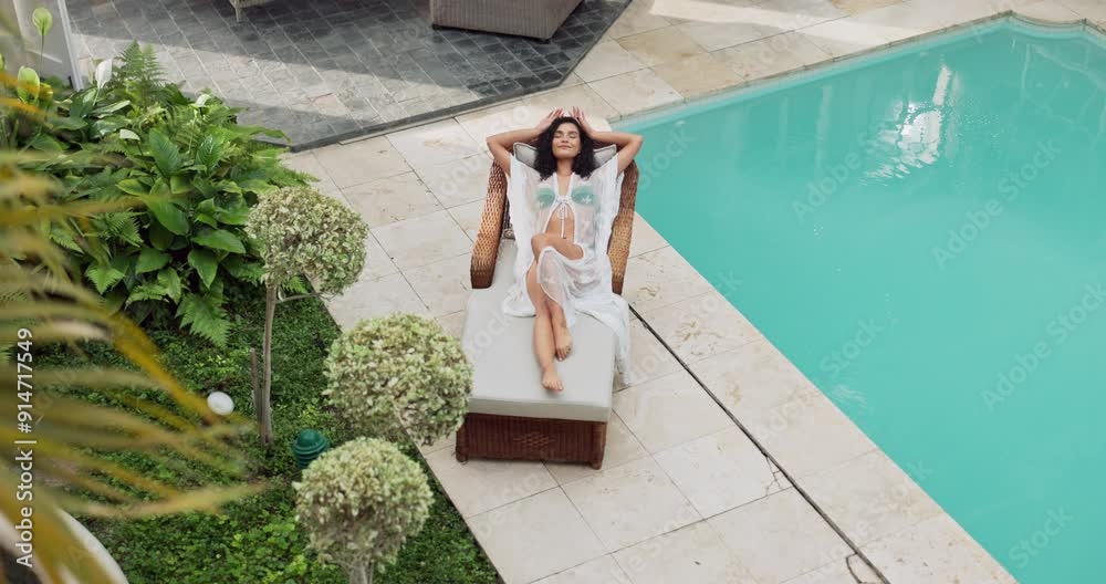 Chair, tanning and woman by swimming pool in hotel for holiday, vacation and weekend trip to relax. Summer travel, sunlounger and girl with trendy style in resort, lodge and top view for calm peace