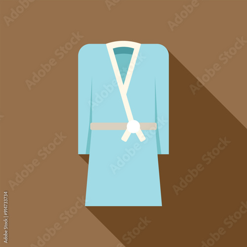 Light blue bathrobe hanging on a brown background
