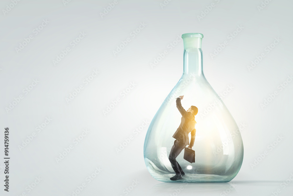 Businessmen scared inside glass bottle Businessmen scared inside glass bottle