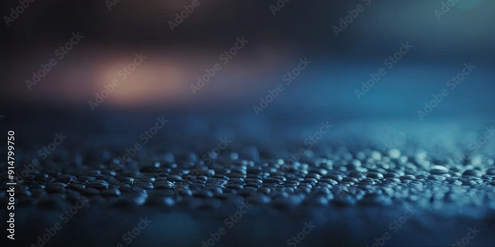 A blurry image of a wet surface with a blue background A blurry image of a wet surface with a blue background