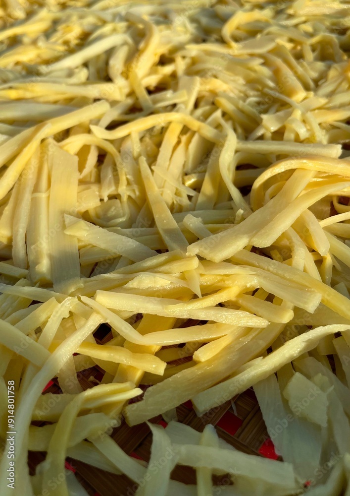 Close up sliced yellow Pickled bamboo shoots with sun light Close up sliced yellow Pickled bamboo shoots with sun light