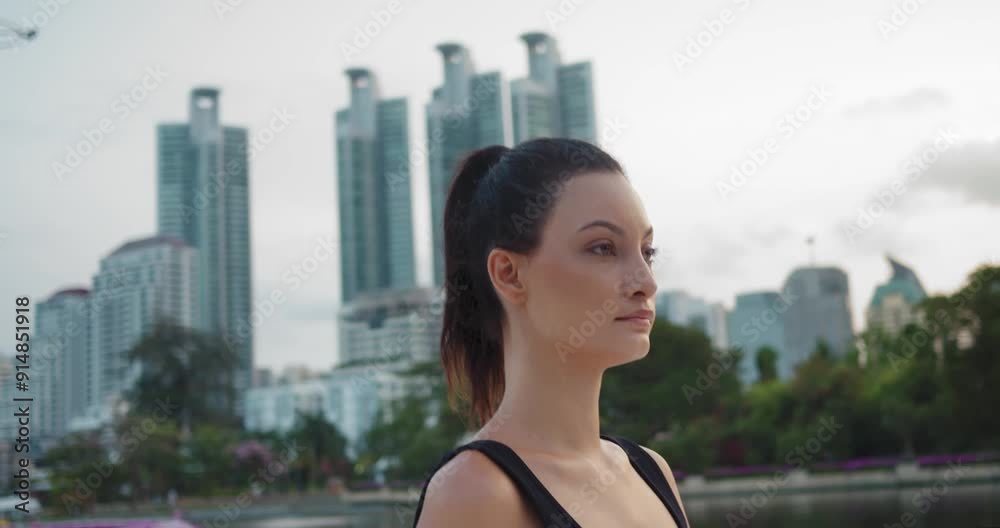 Bustling cityscape woman walking through urban park relaxing and happiness. Woman walking urban park health benefits leisurely walk Against backdrop skyscrapers woman walking in urban park. Bustling cityscape woman walking through urban park relaxing and happiness. Woman walking urban park health benefits leisurely walk Against backdrop skyscrapers woman walking in urban park.