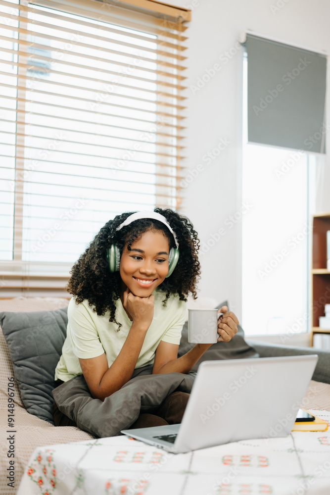 Young woman using a tablet in a cozy home, capturing creativity, relaxation, and digital connection Young woman using a tablet in a cozy home, capturing creativity, relaxation, and digital connection